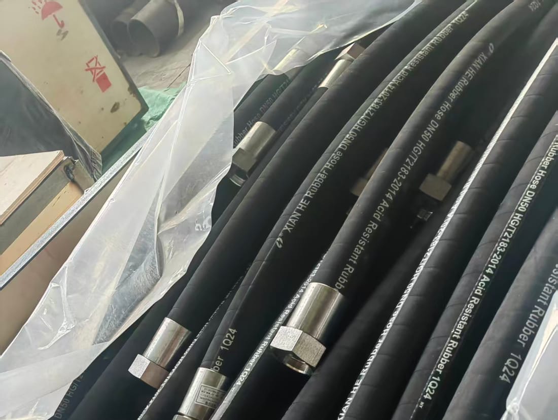 Hydraulic hose stamped with specification DN50 HG/T2183-2014, checked against the purchase order